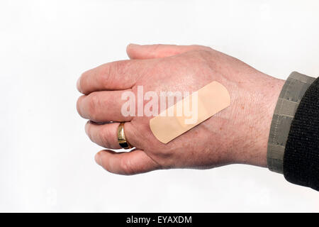 Hand Mann Pflaster Stockfoto