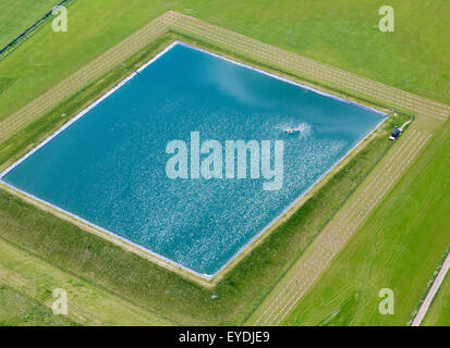 landwirtschaftliche Bewässerung Teich in Suffolk, UK Stockfoto