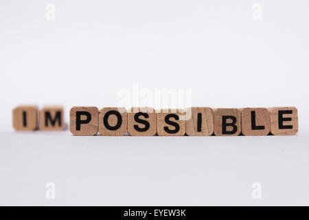 möglich / unmöglich, Motivation Metapher / Konzept Text auf weiß Stockfoto