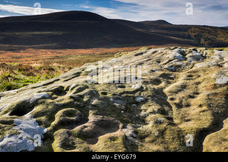 Tasse und Ring gekennzeichnet Felsen am Lordenshaws in der Nähe von Rothbury, Northumberland, England Stockfoto