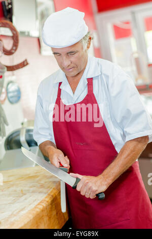 Bucher, Messer schärfen Stockfoto