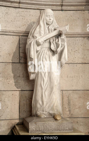 Heilige Rita von Cascia geboren Margherita Lotti 1381-1457 Italienische Augustinerin Nonne.Statue in der Sacré-Cœur römisch-katholischen Kirche in Paris Frankreich Stockfoto