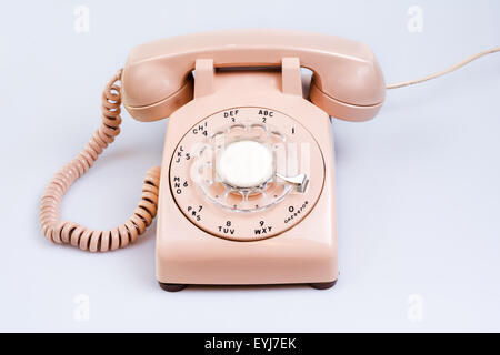 Rotierende Telefon auf weiß Stockfoto