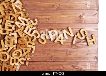 Wort Spanisch gemacht mit Holzbuchstaben Stockfoto