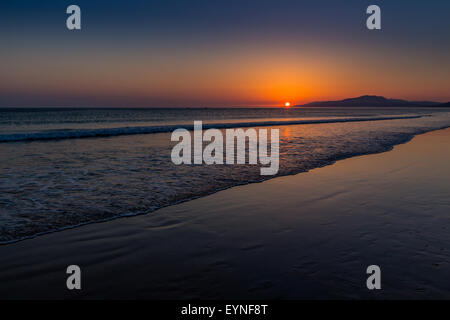 Sonnenuntergang über dem Ozean, Tarifa, Spanien Stockfoto