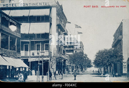 Port Said, Ägypten - 1900 s - eine Postkarte von der Suez-Kanal-Stadt an der Mündung des Suez-Kanals am Mittelmeer, ein Blick auf den Boulevard du Hafen.   COPYRIGHT FOTOSAMMLUNG VON BARRY IVERSON Stockfoto