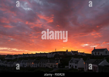 Sonnenuntergang über der Portnahaven, Isle of Islay, Schottland Stockfoto