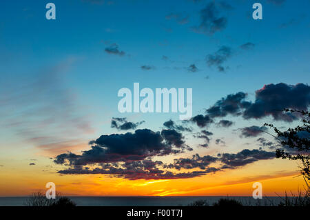 Sonnenuntergang über die irische See von der Isle Of Man Stockfoto