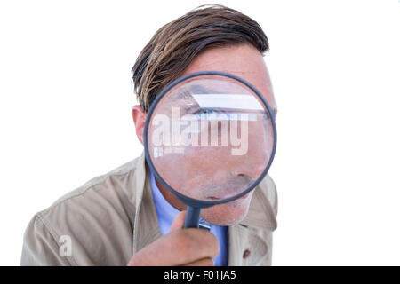 Spion Blick durch die Lupe Stockfoto