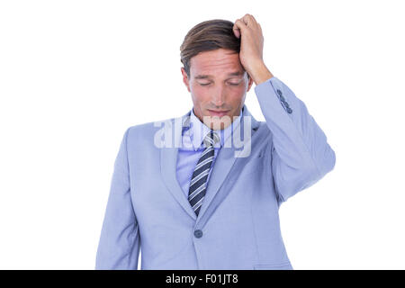 Gestressten Geschäftsmann bekommen Kopfschmerzen Stockfoto