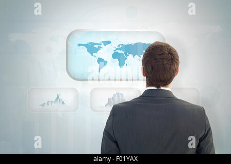 Zusammengesetztes Bild der Geschäftsmann im Anzug nachschlagen Stockfoto