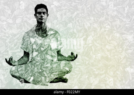 Zusammengesetztes Bild gut aussehender Mann im weißen meditieren im Lotus pose Stockfoto