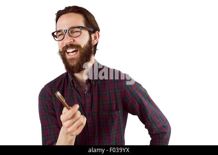 Hübsche Hipster lachte und zeigte Stockfoto