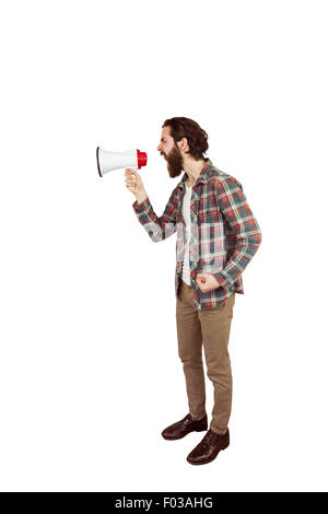 Hübsche Hipster über Megaphon schreien Stockfoto