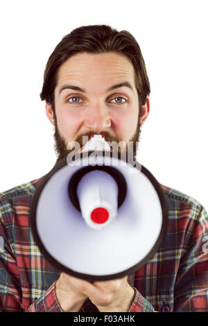 Hübsche Hipster über Megaphon schreien Stockfoto