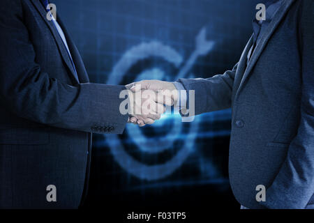 Zusammengesetztes Bild von Close Up auf zwei Geschäftsleute Händeschütteln Stockfoto