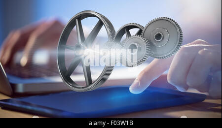 Zusammengesetztes Bild aus Metall Zahnräder und Räder verbinden Stockfoto