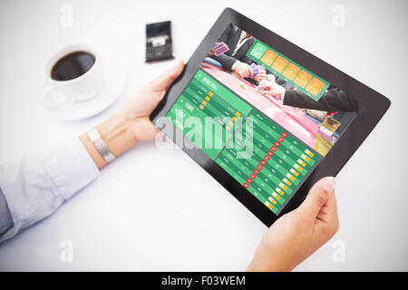 Zusammengesetztes Bild des Mannes mit TabletPC Stockfoto