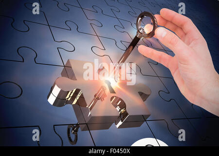 Zusammengesetztes Bild der Geschäftsmann im Anzug hält seine Hand Stockfoto