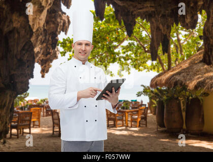 glücklich männlichen Chef-Koch mit TabletPC Stockfoto