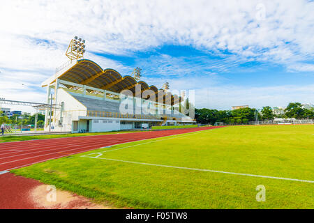 Football field with green grass at sunny day morning blue sky Stockfoto