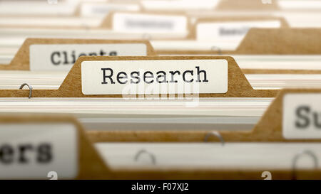 Forschungskonzept mit Word auf Ordner. Stockfoto