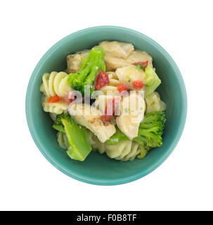 Draufsicht auf eine kleine Portion von gegrilltem Hähnchen mit ausgewähltes Gemüse und Knoblauchsauce in einer kleinen Schüssel Stockfoto