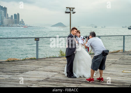 Fotograf fotografiert Hochzeit in Hong-Kong Stockfoto