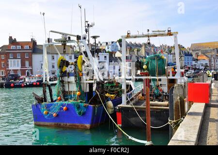 Angelboot/Fischerboot vor Anker im Hafen von Weymouth, Dorset, England Stockfoto