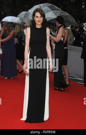 London, UK, 11. August 2015, Michelle Dockery besucht BAFTA Sonderpreis Ehrung für ITV Downton Abbey im Richmond Theatre für besondere Hommage-Programm namens "Bafta feiert Downton Abbey", die später in Jahr ausgestrahlt werden. Stockfoto