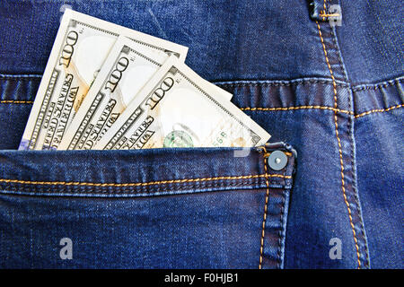 Geld in der Tasche der jeans Stockfoto