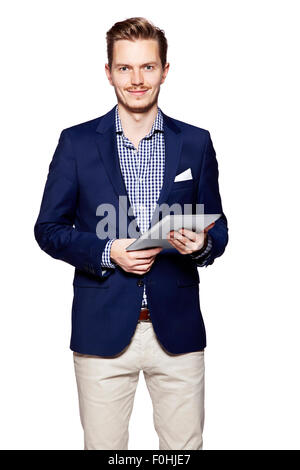Schönen jungen Mann mit digital-Tablette. Stehend auf weißen Hintergrund isoliert Stockfoto