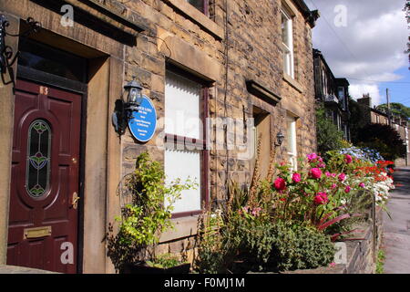 Eine blaue Plakette auf der Terrasse Haus in Hayfield, Derbyshire markiert den Geburtsort von Dad's Army Schauspieler, Arthur Lowe Stockfoto