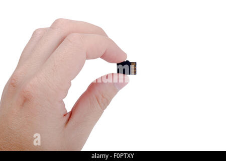 Flash Media-SD-Karte in der Hand isoliert auf weißem Hintergrund Stockfoto