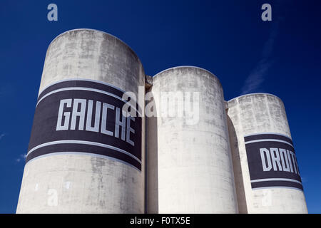 Gauche links und Droite rechts Beschilderung auf alten industriellen Lagersilos der ehemaligen Zuckerfabrik in Rambaud Port, Lyon, Frankreich. Stockfoto