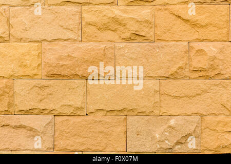 Close-up-Aufnahme aus Stein gemauerte Wand Textur und Detail offenbart. Stockfoto