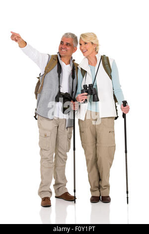 glückliches Paar Sightseeing und zeigt Richtung Stockfoto