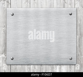 Zusammensetzung von Metall Aluminium Plaque, Typenschild auf Holzwand Planken Stockfoto