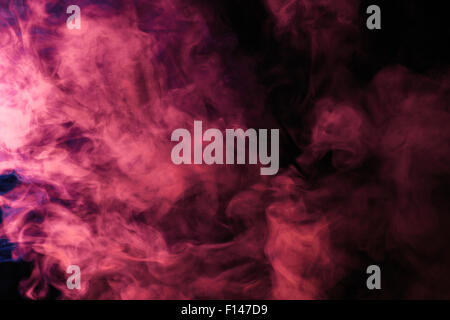 Abstrakten farbigen Rauch Shisha auf einem schwarzen Hintergrund. Fotografiert mit einem Gel-Filter. Textur. Design-Element. Stockfoto