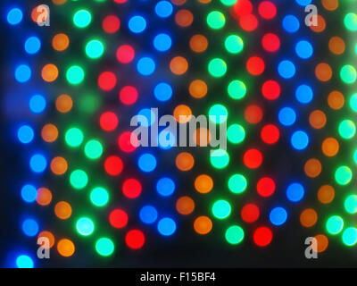 Draufsicht auf das verschwommene helle Kreise farbige abstrakte Bild abgeleitet aus einem Foto von defokussierten Glühbirnen Stockfoto