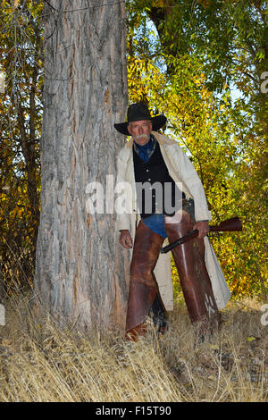 Porträt von Cowboy mit Gewehr, Shell, Wyoming, USA Stockfoto