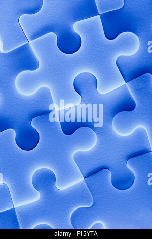 Jigsaw Puzzle-Teile als Hintergrund in Nahaufnahme Stockfoto