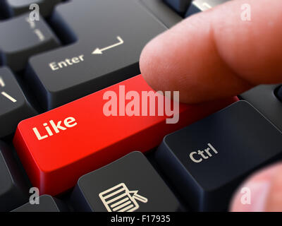 Person rote Tastatur-Button mit Text wie anklicken. Selektiven Fokus. Detailansicht. Stockfoto