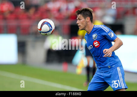 Toronto, Ontario. 29. August 2015. Montreal Impact Mittelfeldspieler Maxim Tissot (51) versucht, den Ball zu kontrollieren, während das MLS-Spiel zwischen Montreal Impact und der Toronto FC im BMO Field in Toronto, Ontario. © Csm/Alamy Live-Nachrichten Stockfoto