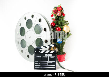 Film-Klappe und Walzen mit Weihnachtsbaum Stockfoto