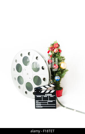 Film-Klappe und Walzen mit Weihnachtsbaum Stockfoto