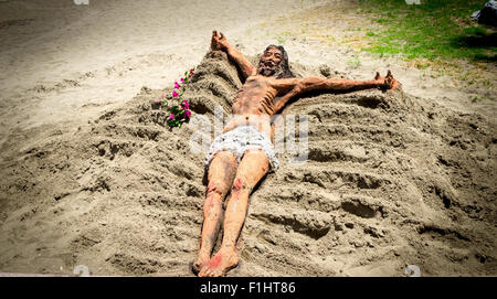 Sandskulpturen von Jesus an einem Strand in Benalmadena Spanien Stockfoto