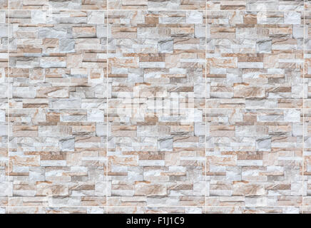 Graue Pflaster Platten in Form von rechteckigen mit unterschiedlicher Größe. Nahtloses aneinander Textur. Stockfoto