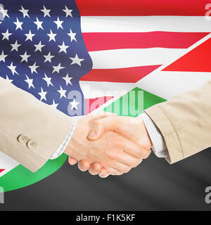 Geschäftsleute Händeschütteln - USA und Sudan Stockfoto