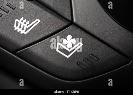 Beheizten und belüfteten Autositz Kontrollen. Wärme und Lüftung Buttons Closeup Stockfoto